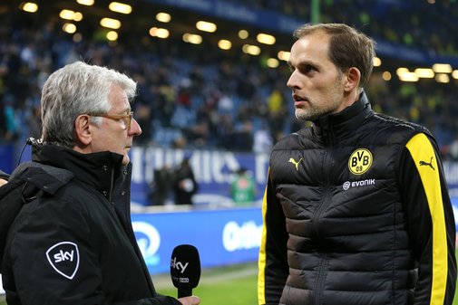 Marcel Reif und Thomas Tuchel Marcel Reif interviewt Fußballtrainer Thomas Tuchel im Stadion.